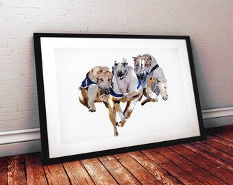 May include: Framed artwork featuring three greyhounds in mid-run. The dogs are depicted in a watercolor style, with shades of brown, grey, and white. Each dog wears a blue collar or jacket. The artwork is displayed in a black frame.