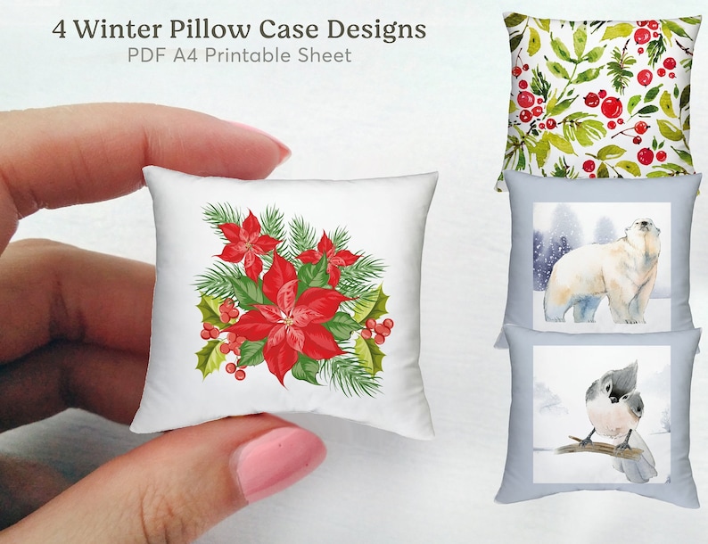 May include: The image shows four winter pillow case designs. One pillow features a poinsettia arrangement with red flowers and green leaves. Other designs include a polar bear, a bird, and a pattern of red berries and green leaves. Text reads: "4 Winter Pillow Case Designs PDF A4 Printable Sheet."