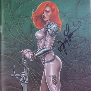 May include: A woman with red hair wearing a white and silver outfit holds a sword with a rose design. The image is signed "Jim Lee".