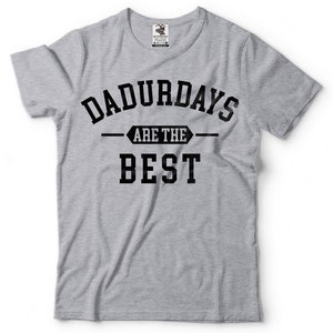 May include: Gray t-shirt with black text that reads "Dadurdays are the best".