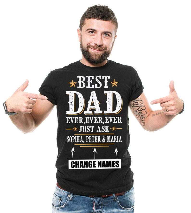 May include: Black t-shirt with white text that reads "★BEST★ DAD EVER, EVER, EVER -★JUST ASK-★ SOPHIA, PETER & MARIA &uarr; CHANGE NAMES"