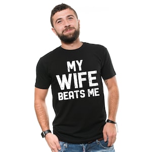 Mens Funny Sarcastic T-Shirt: My Wife Beats Me - Husband Dad Gift