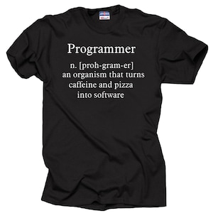 May include: Black t-shirt with white text that reads "Programmer n. [proh-gram-er] an organism that turns caffeine and pizza into software"