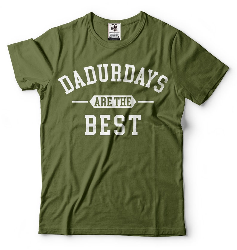 May include: A green t-shirt with white text that reads "Dadurdays are the best".