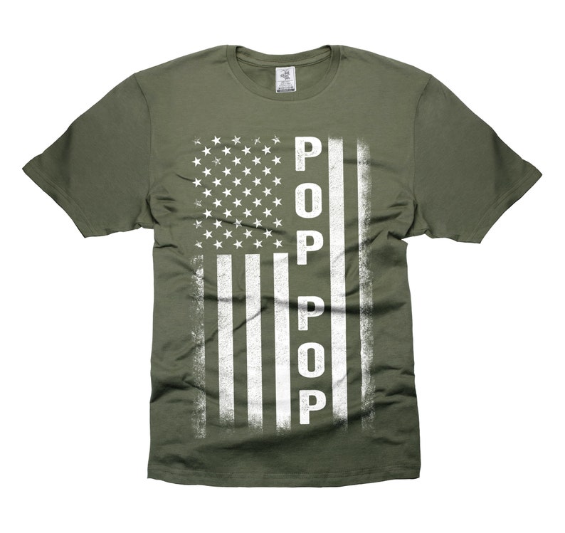 May include: A green t-shirt with a white distressed American flag design and the word "POP" vertically down the right side of the flag.