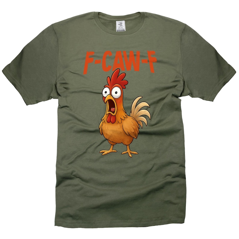 May include: Olive green t-shirt featuring a cartoon chicken with an open beak and the text "F-CAW-F" in red. The chicken has red comb and wattle, with a tan body and yellow feet.
