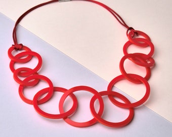 Bright red chunky circle link modern statement necklace.