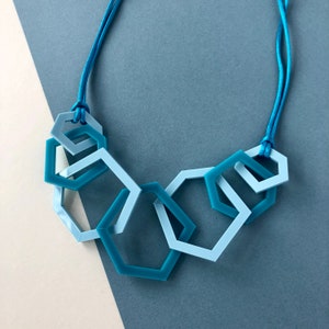 Turquoise and pale blue modern geometric acrylic necklace.