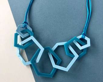 Turquoise and pale blue modern geometric acrylic necklace.