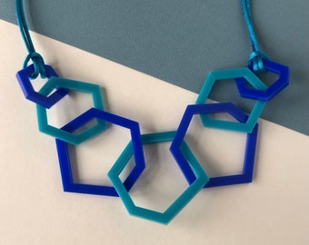 Turquoise and royal blue modern geometric acrylic necklace.