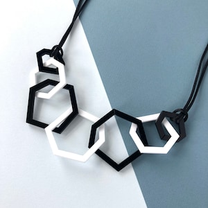 Black and white modern geometric mid-length necklace.