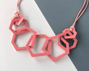 Coral pink modern geometric stylish necklace.
