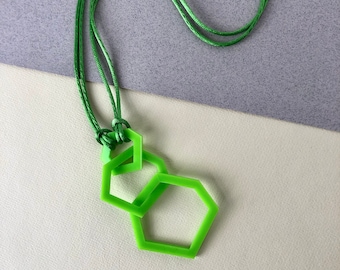 Bright lime green pendant geometric acrylic necklace.