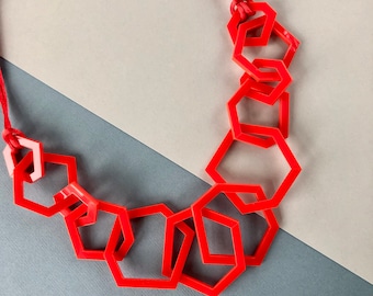 Bright red modern geometric stylish acrylic necklace.