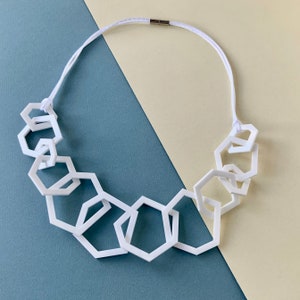 White modern geometric chunky mid-length necklace.