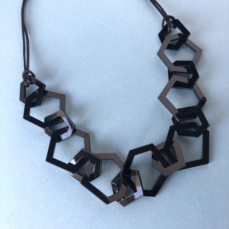 Black modern geometric chain link acrylic necklace. image 1