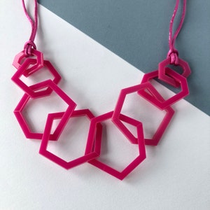 Fuschia pink mid-century modern geometric acrylic necklace.