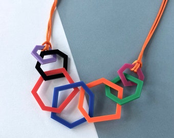 Multicolour modern geometric mid-length perspex necklace.