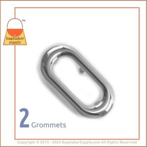 May include: Two silver oval grommets, each with a hole in the center. The grommets are isolated on a white background. 2 Grommets.