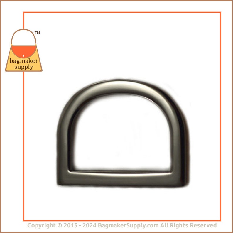May include: A silver-toned metal D-ring hardware for bags and other crafts. The ring is smooth and has a rounded shape.