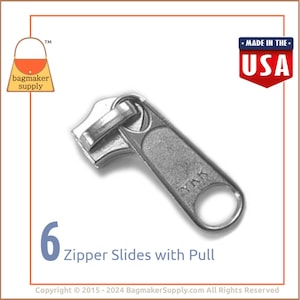 May include: Six silver zipper sliders with pull tabs. The sliders are made by YKK and are made in the USA.