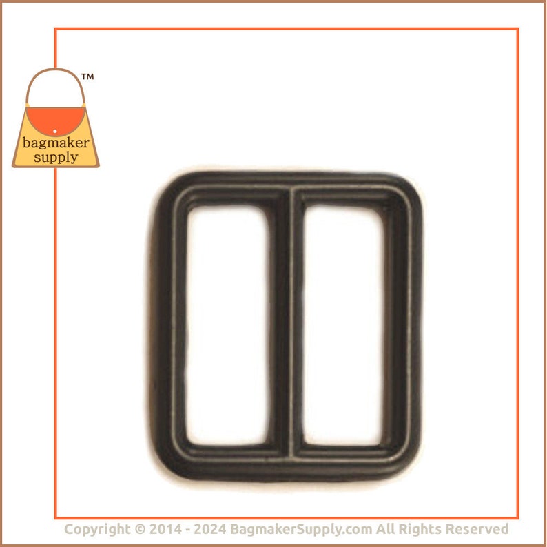 May include: A dark grey rectangular slider buckle with two openings, suitable for bag straps and crafting. The buckle is made of a robust material and is shown against a white backdrop. The bagmaker supply logo is in the top left corner.