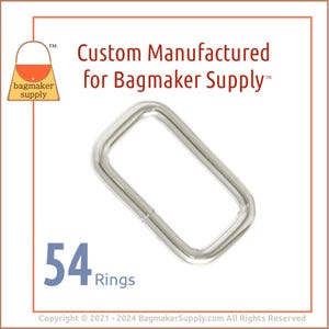 May include: A shiny, silver-colored rectangular ring, likely for bagmaking, is centered on a white background. The image includes the text "Custom Manufactured for Bagmaker Supply" and "54 Rings."