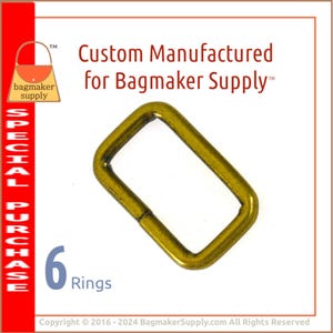 May include: A single, antique brass-colored rectangular ring for bagmaking. The image includes the text "Custom Manufactured for Bagmaker Supply" and "6 Rings". The background is white with a red border and a "Special Purchase" label.