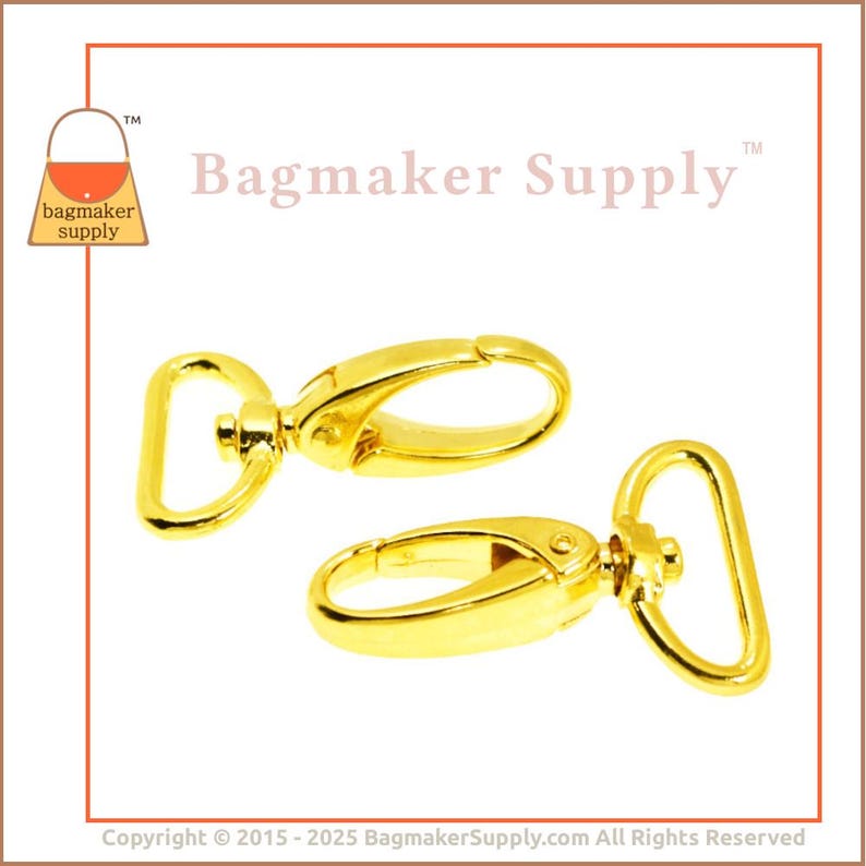 May include: Two gold-tone metal swivel clasps, each with a D-ring and a hook. The clasps are commonly used for attaching straps or chains to bags or other accessories.