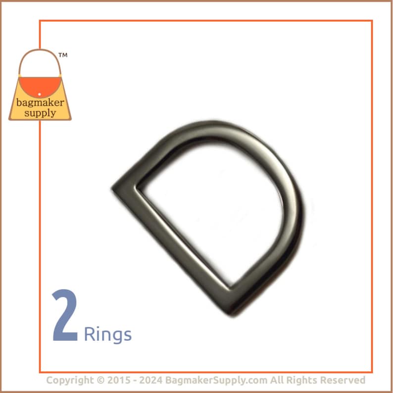 May include: Two silver D-rings, each with a 1-inch inside diameter. The rings are shown against a white background. 2 Rings.