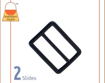 May include: Black plastic slider buckle with two slides. The buckle is angled and has a rectangular shape. 2 Slides.