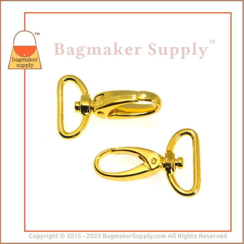 May include: Two gold-tone metal swivel clasps, each with a D-ring and a hook. The clasps are commonly used for attaching straps or chains to bags or other accessories.