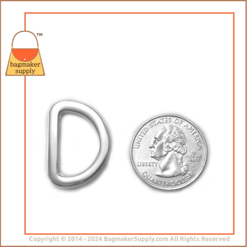 May include: A silver D-ring, approximately the size of a US quarter, for use in crafting and sewing projects.