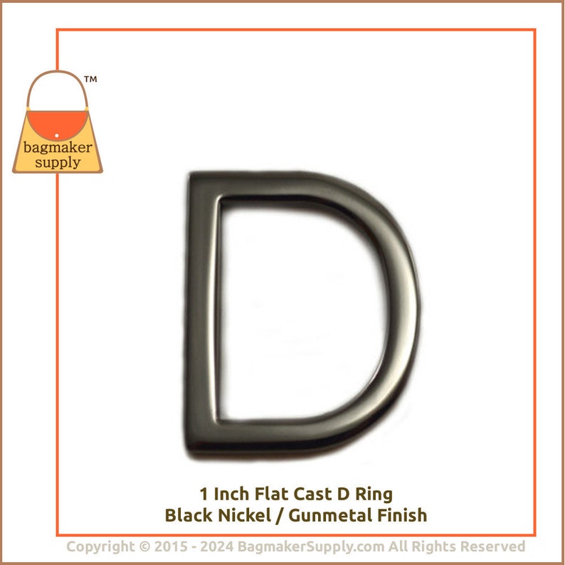 May include: A 1 inch flat cast D ring in a black nickel or gunmetal finish.  The ring is made of metal and has a smooth, rounded edge.