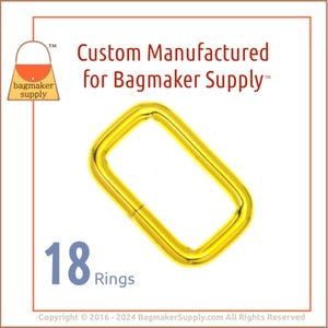 May include: A set of 18 gold-colored metal rings. The rings are rectangular in shape and have a smooth finish. The rings are designed for use in crafting and making bags.