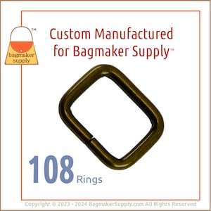 May include: A set of 108 gold-toned metal rings. The rings are square shaped with rounded corners. The rings are approximately 1 inch in size. Custom Manufactured for Bagmaker Supply.