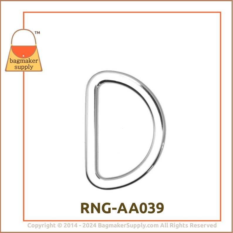 May include: Silver D-ring hardware for bags and crafts. The ring is smooth and has a polished finish. The ring is labeled "RNG-AA039".