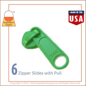 May include: Six green zipper sliders with pull tabs. The sliders are made by YKK and are made in the USA.