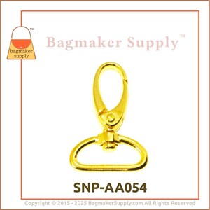 May include: Gold metal swivel hook clasp with a D-ring. The clasp is labeled "SNP-AA054".