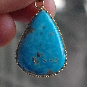 Natural Turquoise in wire surround Pendant