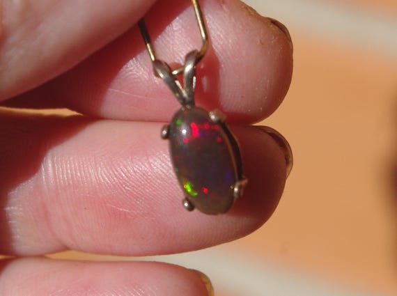 Solid Smoked Dark Welo Opal in Sterling Silver setting