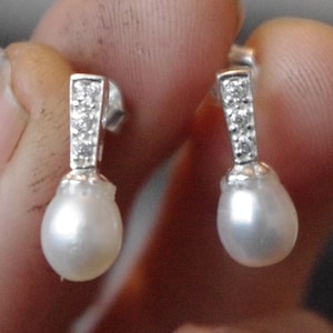 Classic Freshwater Pearl in Sterling Silver setting with cubic zirconuim accents