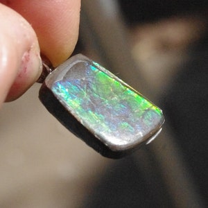 Natural Ammolite on Antiqued copper plated Bronze Maple leaf bail