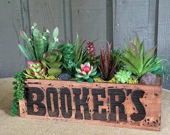 Faux succulents arrangement in Bookers box masculine decor for man who has everything