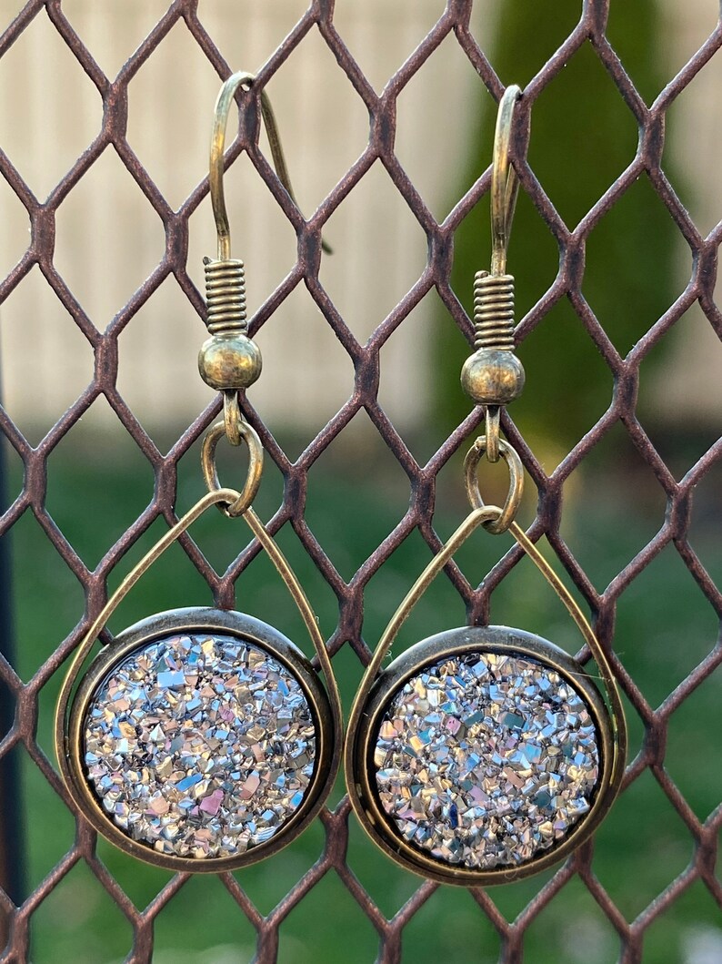 Pewter druzy geode dangle earrings Zinc alloy plated in antique Silver druzy geode dangle earrings Antique silver arrowhead earring