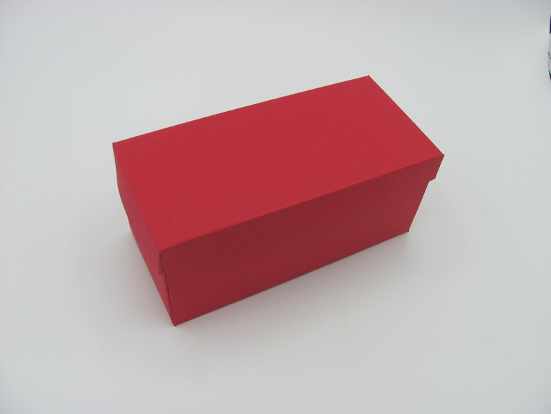 Explosionsbox Geschenkverpackung Geschenkbox Geschenk Geschenkkarton Schwarz Weiss Rot Blau Grün Rot