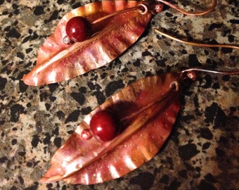 Hand forged copper leaf earrings with berry dangle