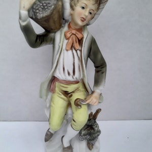 Porcelain Tuscany Figurine Boy   With Basket of Grapes Homco Bisque. Porcelain Antique