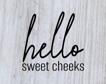 May include: Black and white graphic design with the text "hello sweet cheeks" and "SVG. PNG. DXF" on a white wood background.