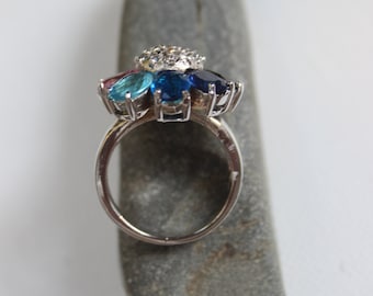 Sterling Silver Flower Ring: CZ Blue Gem Cocktail Ring